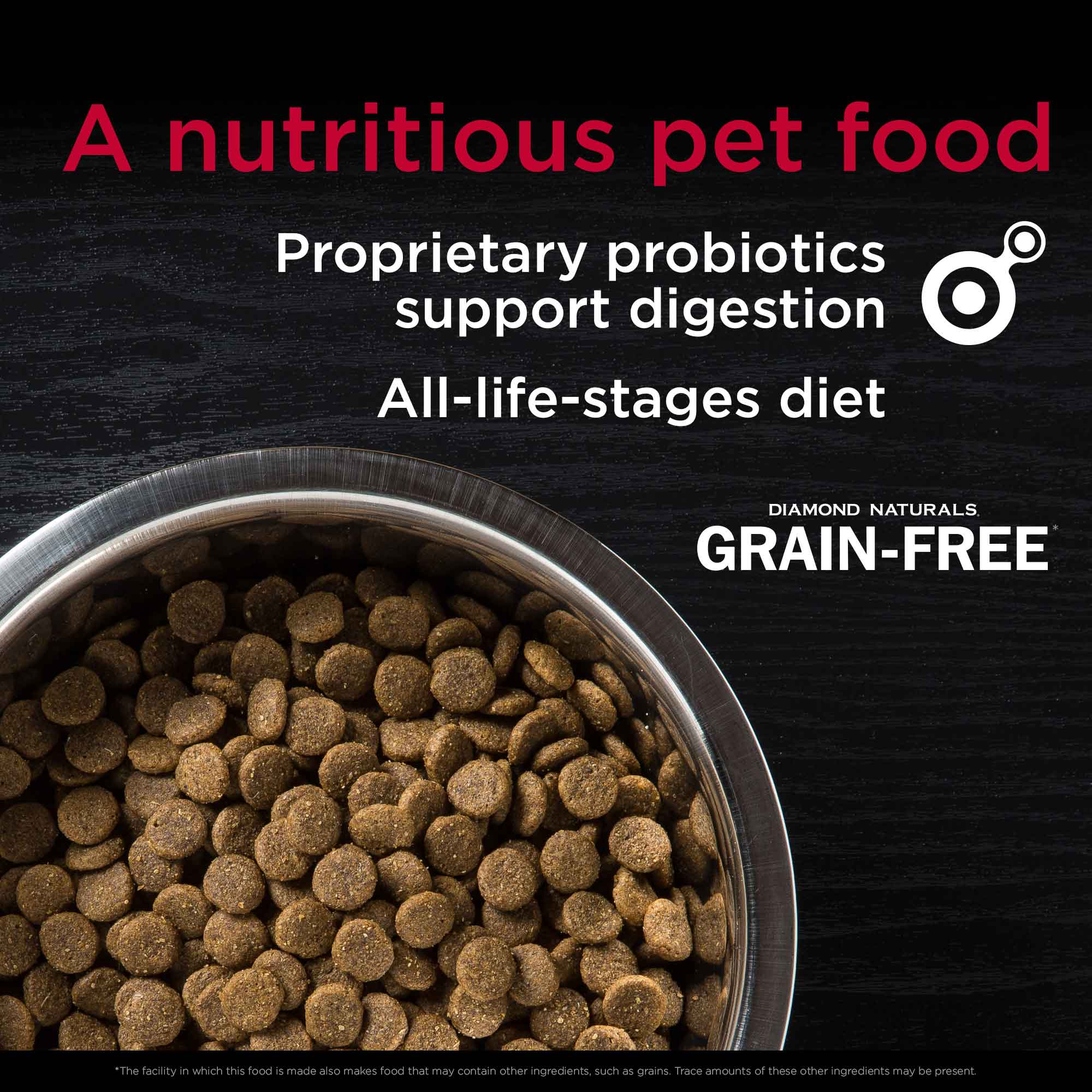 A metal bowl full of Diamond Naturals Grain-Free Cage-Free Chicken & Sweet Potato Formula for Dogs kibble.
