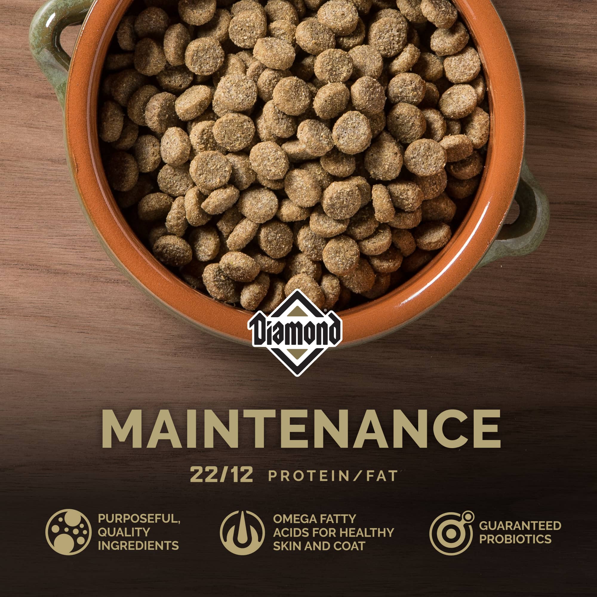 An orange ceramic bowl filled with Diamond Maintenance kibble.
